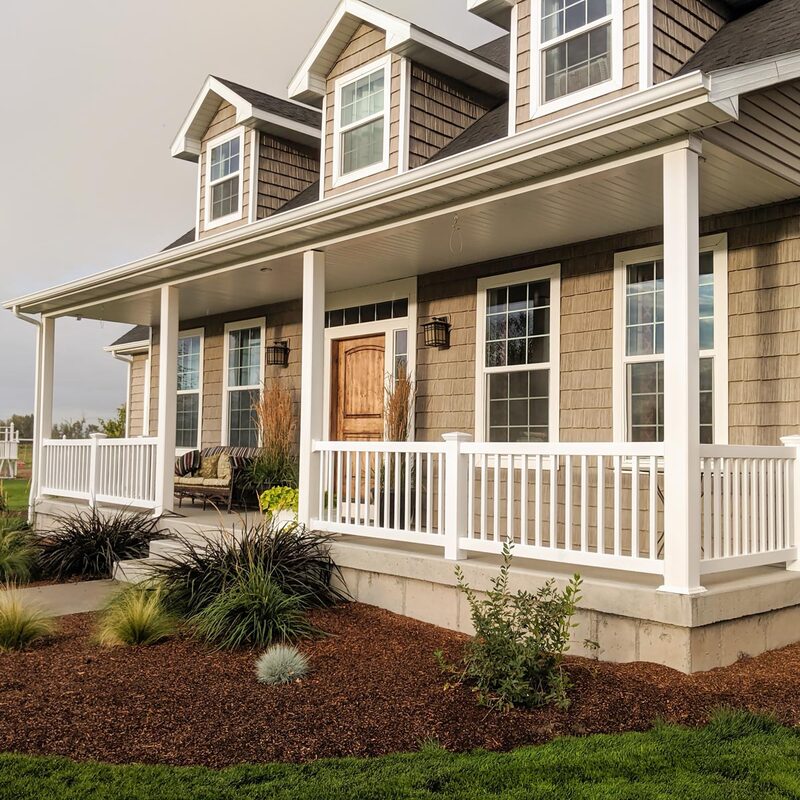 1) Unique, SEO-Effective Project Name
Traditional Shingle Home Front Porch with Low-Maintenance White Vinyl Railings
2) Description
Transform your traditional shingle home’s curb appeal with this classic custom front porch designed and installed by the specialists at DeckPro LLC. This expansive porch perfectly complements the home's multi-dormer traditional architecture. It features substantial white vinyl columns that support the large covered area, ensuring structural integrity with a clean aesthetic. We utilized a premium, low-maintenance white vinyl railing system with decorative balusters (pickets) and post caps to create a safe and stylish enclosure.
